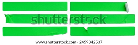 A set of fluorescent neon green rectangular paper sticker label isolated on white background.