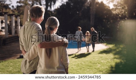 Senior couple, garden and hug from behind with family for good memories, growth and goodbye together in backyard. Man, woman and back view in nature with embrace, pride and heartwarming at home Royalty-Free Stock Photo #2459344785