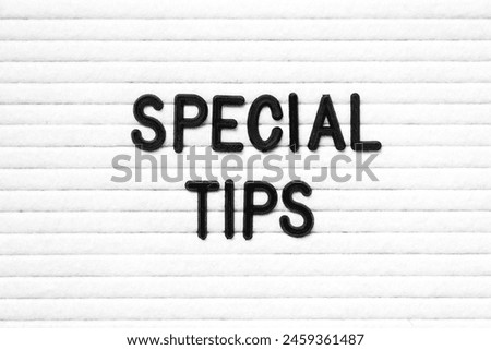 Black color letter in word special tips on white felt board background