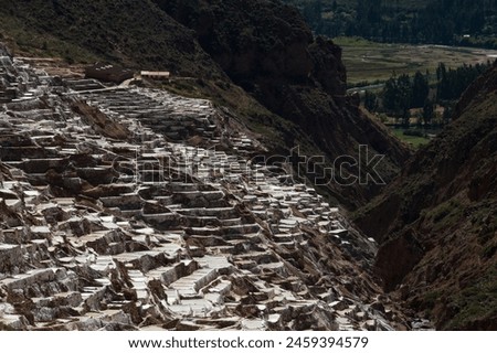 Mountain with salt terraces in the reserve called Salineras de Maras in the sacred valley.