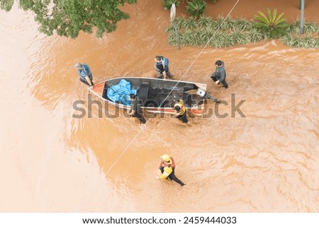 Flood in southern Brazil leaves the city of Igrejinha flooded and residents are rescued Royalty-Free Stock Photo #2459444033