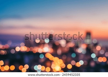 The lights of the night city. Blurred background. Lanterns on the street. big city lights in the twilight evening with blurring. Colorful circles of light abstract. circular bokeh on blue horizon.