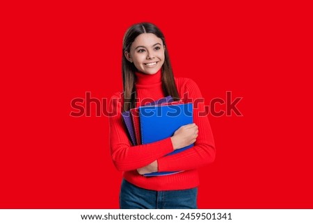 Teen student girl with school workbook ready study and get knowledge isolated on red