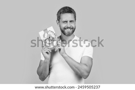 happy man hold present box in studio. man with present box for holiday. photo of man