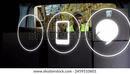 Image of network of icons over caucasian man loading car with boxes, working in warehouse. Global shipping, business, finances, computing and data processing concept digitally generated image. Royalty-Free Stock Photo #2459510601