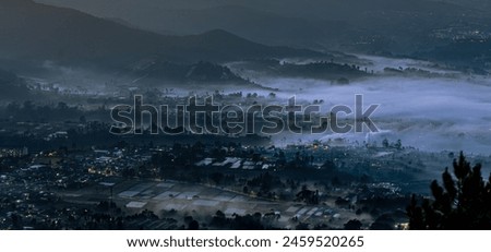 morning on a foggy mountain, city foggy view in mountain,  Landscape photography of view in mountain