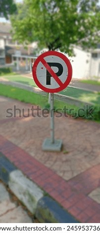 Front view of No Parking sign.