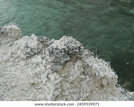 Landscape photo with a background of sea water and coral in the afternoon
