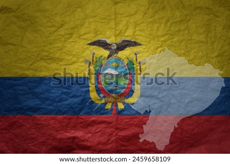 colorful big national flag and map of ecuador on a grunge old paper texture background