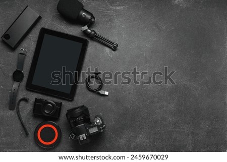 Set of different gadgets on dark background
