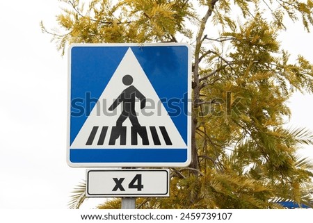 Road safety sign indicating four suxessive crosswalks