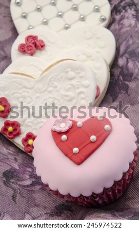 Butter cookies decorated with fondant and cupcake
