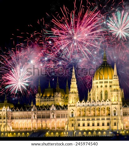 Fireworks over Hungarian parliament in Budapest. New years eve in Budapest, Hungary. Royalty-Free Stock Photo #245974540