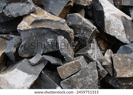 Natural loose stones, filling stones, black in various sizes. Royalty-Free Stock Photo #2459751315