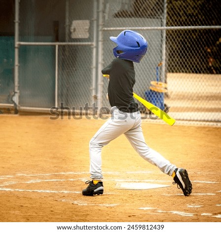 Boy getting ready to swing a baseball bat