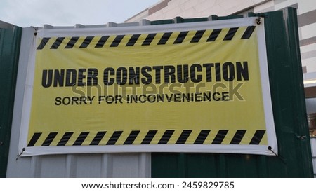 Under Construction Sign near a building