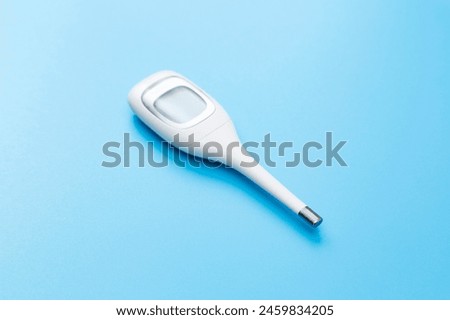Thermometer on a blue background.