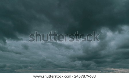 Cloudy Rainy Heavy Grey Dramatic Clouds Moving In Heaven. B-Roll Scene Of Black Raincloud Cover. Royalty-Free Stock Photo #2459879683