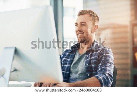 Thinking, business and man with computer, typing and online reading with journalist, internet and website info. Person, employee or magazine editor with pc, smile and opportunity with problem solving