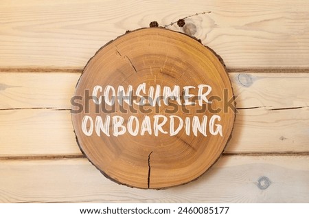 Consumer onboarding symbol. Concept words Consumer onboarding on beautiful wooden circle. Beautiful wooden wall background. Business consumer onboarding concept. Copy space.