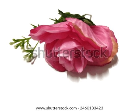 plastic flower of a pink garden roses isolated on white background