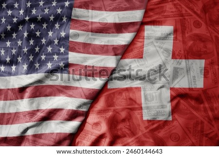 big waving colorful flag of united states of america and national flag of switzerland on the dollar money background. finance concept. macro