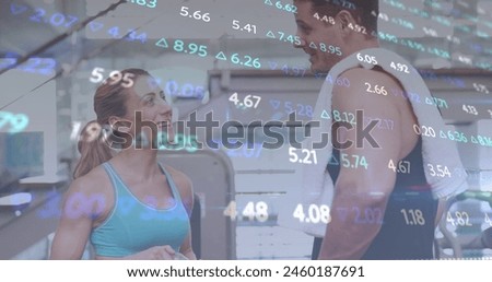 Image of data processing over caucasian couple exercising at gym. Global sport and digital interface concept digitally generated image.