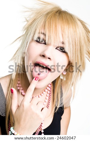 Emo girl showing her piercing on tongue