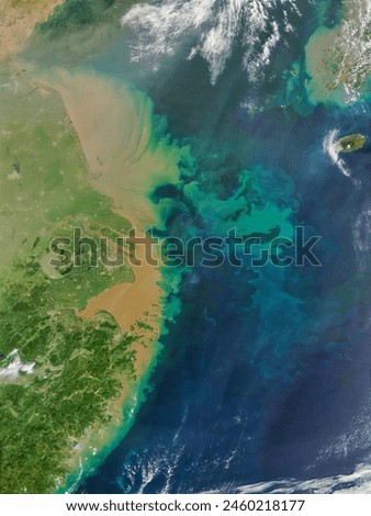 Heavy Sediment from the Yangtze River. The heavy load of sediments carried by the Yangtze River into the East China Sea colored the waters. Elements of this image furnished by NASA.