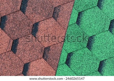 It's close up view of mosaic colorful tile. It is photo of green and a brown roof tiles. It is view of multicolored texture of tiles.