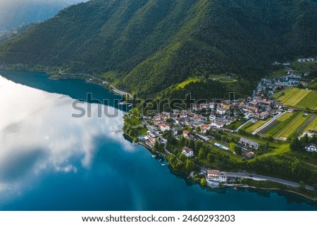  Aerial View of Lago di Ledro in Trentino, Italy, Tranquil Lakeside Village Surrounded by Lush Alpine Scenery