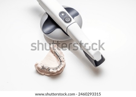 Isolated 3D Intraoral Teeth Scanner For Imaging Tooth and Metal Frame Lower Partial Denture, Cobalt Chrome Dental Plate, Bridge Printed By 3d Printer. Dental Equipment, Device, Dentistry. Horizontal