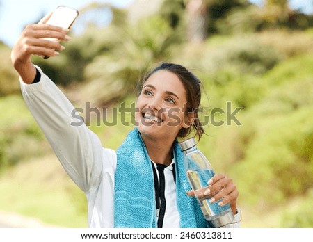 Woman, selfie and bottle with water to drink, health or hydration for sports, training or workout. Outdoor, female person and athlete with picture after exercise for fitness, wellness and cardio