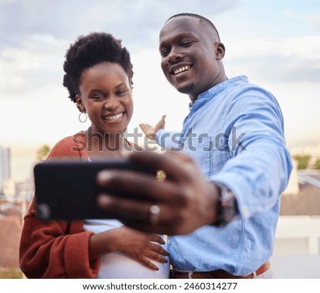 Black couple, selfie and outdoor on balcony, happy and show city in profile picture on social media. Man, pregnant woman and smile with live streaming with travel vlogging on vacation with memory