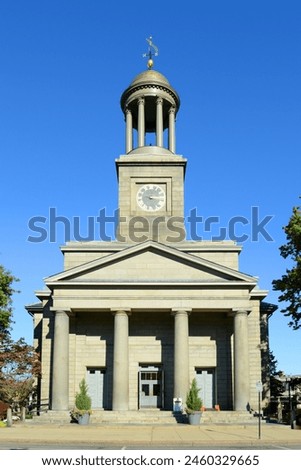 United First Parish Church was built in 1828 in downtown Quincy, Massachusetts MA, USA. Presidents John Adams and John Quincy Adams are buried in the family crypt beneath the church.  Royalty-Free Stock Photo #2460329665