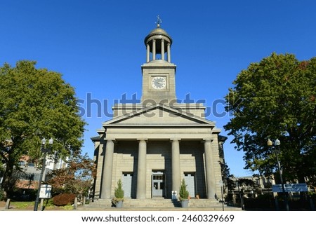 United First Parish Church was built in 1828 in downtown Quincy, Massachusetts MA, USA. Presidents John Adams and John Quincy Adams are buried in the family crypt beneath the church.  Royalty-Free Stock Photo #2460329669