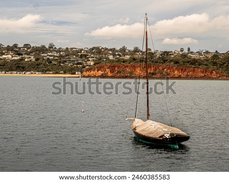 Classic Couta Boat Anchored In Calm Sea