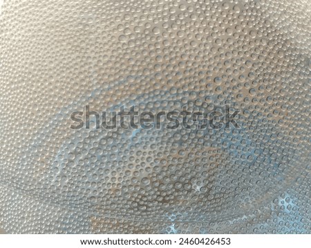 close up of water droplets in a gallon of drinking water