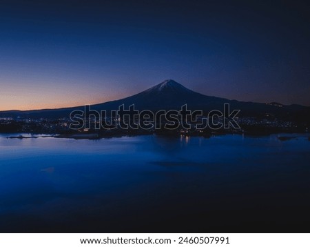 Mt. Fuji in the early morning_Snow-capped_Aerial view of Lake Kawaguchi_Drone aerial photography