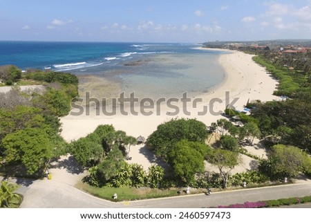Aerial view of the coastline and white sand
