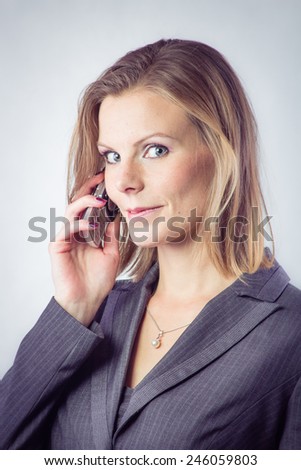 Happy Business Woman talking on the mobile Isolated, White Background