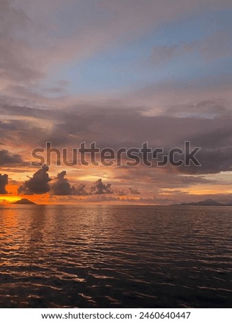Sunset is the disappearance of the Sun below the horizon of the Earth (or any other astronomical object in the Solar System) due to its rotation. Royalty-Free Stock Photo #2460640447