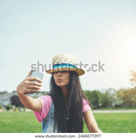 Outdoor, girl and selfie with attitude in park for profile picture on social media or memory of summer vacation in California. Woman, pout and hat with photography or live blog for content creation.