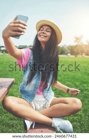 Smile, girl and selfie on bench in park for profile picture on social media or memory of summer vacation in California. Woman, sunshine and holiday with photography or live blog for content creation.