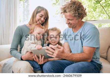 Kids, parents and relax with tablet on sofa, house and bonding, watching movie or streaming online for entertainment. Family, girl and together, internet and screen, subscription or cartoon film