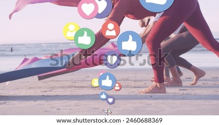 Image of media icons over diverse women with yoga mats at beach. social media and communication interface concept digitally generated image.