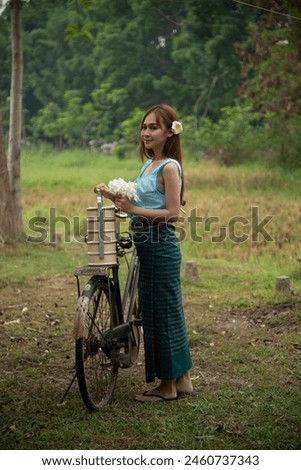 Pictures of Thai men and women in the ancient style of daily life in the rice fields in the past Fashion, rice fields, ancient Thailand