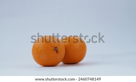 Close up picture of orange fruit. Orange fruit stock image. Fruit photography.
