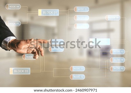 Double exposure of programmer's hand working with abstract creative programming illustration on blurred office background, big data and blockchain concept