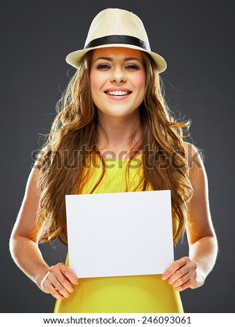 happy smiling woman holding white blank board . yellow dress .